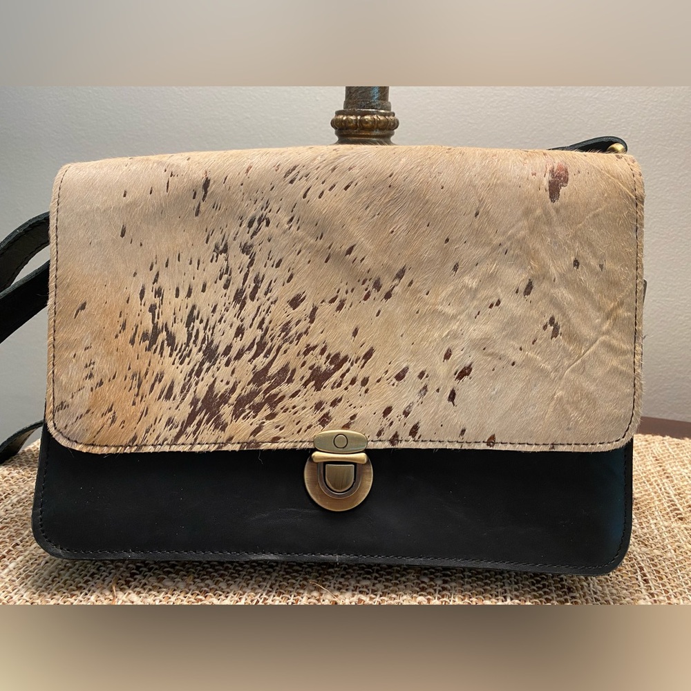 Brand New Charlie Page bag with adjustable strap and inner zipper pocket.